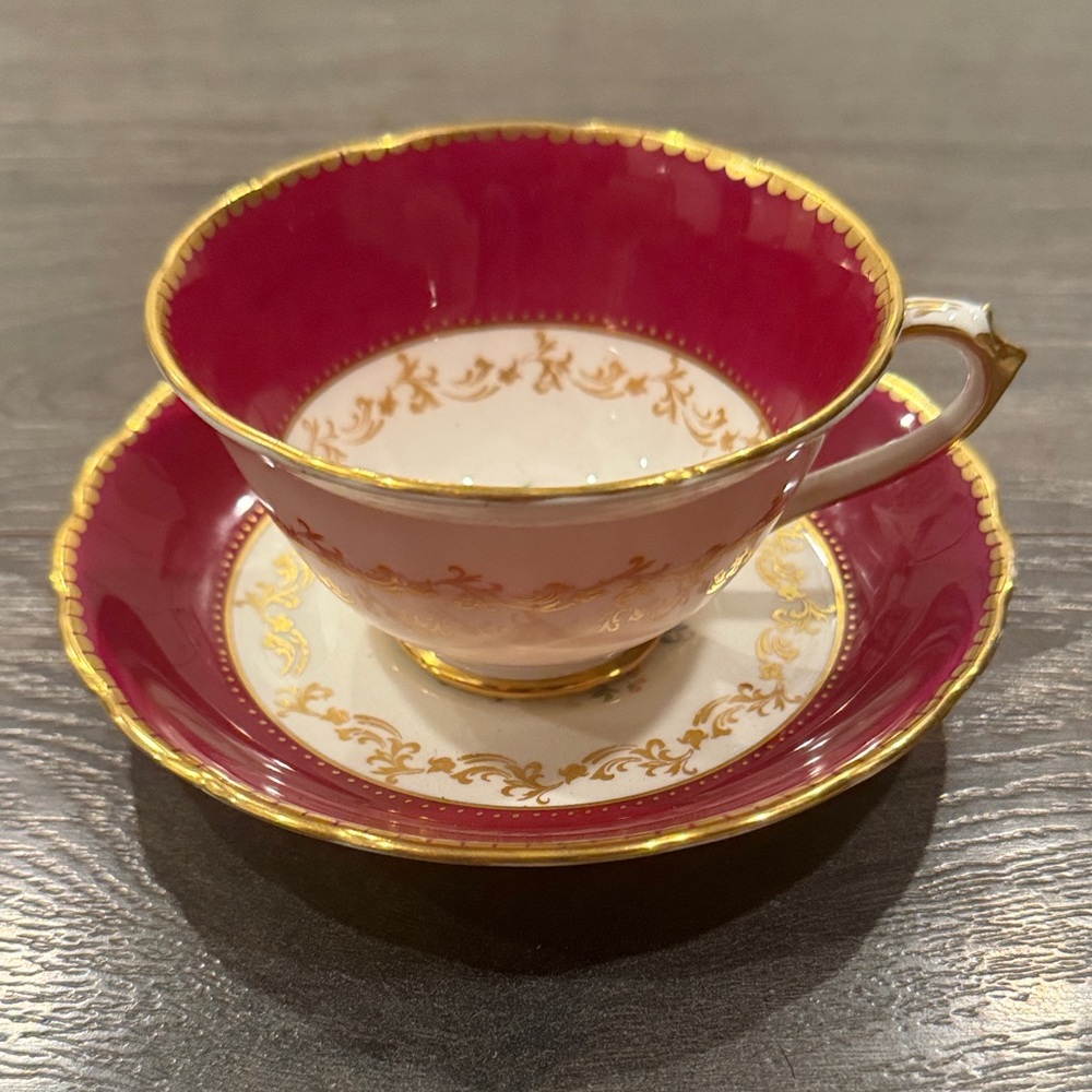 Elegant Red and Gold Teacup and Saucer Set